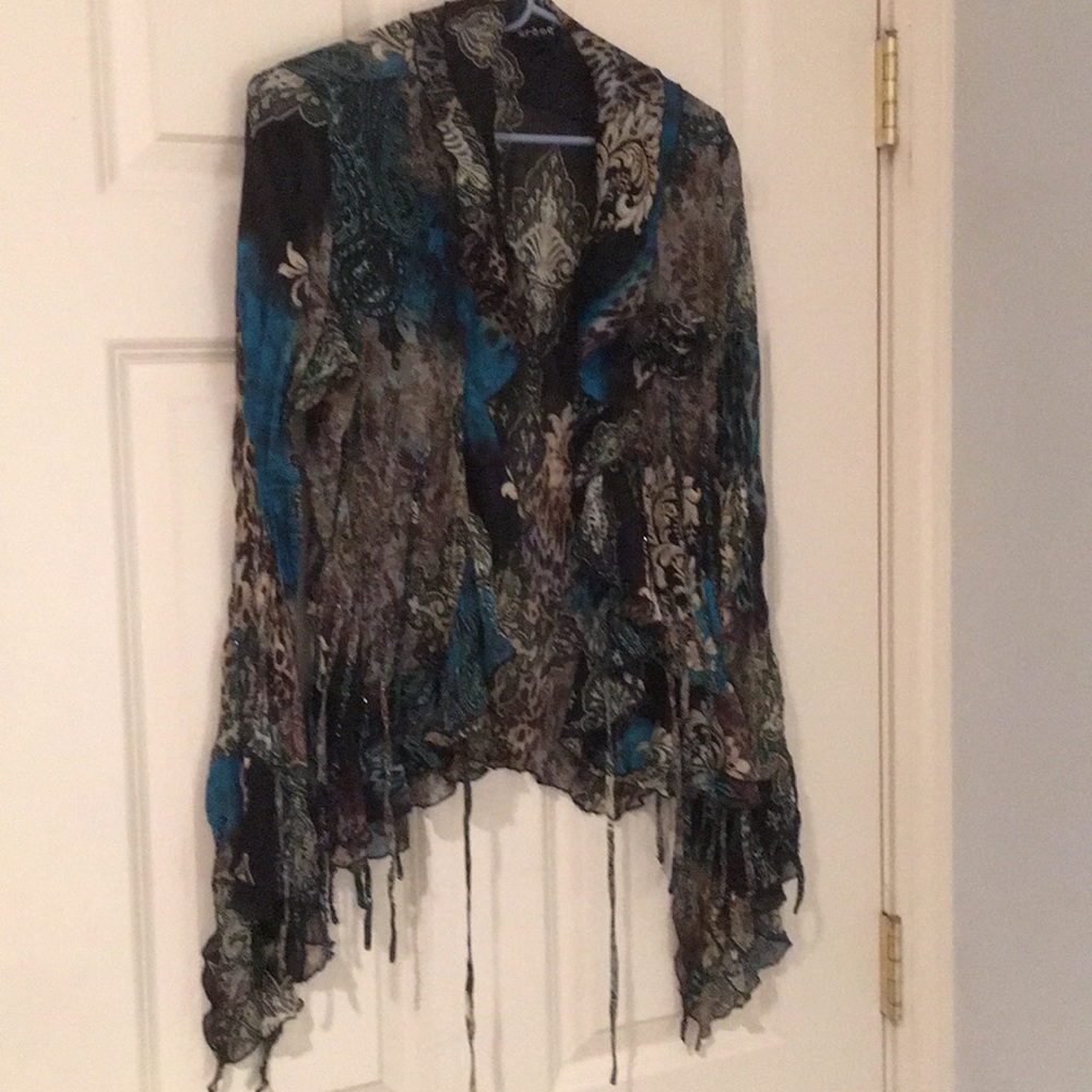 Gorgeous top in black,teal,cream,brown.